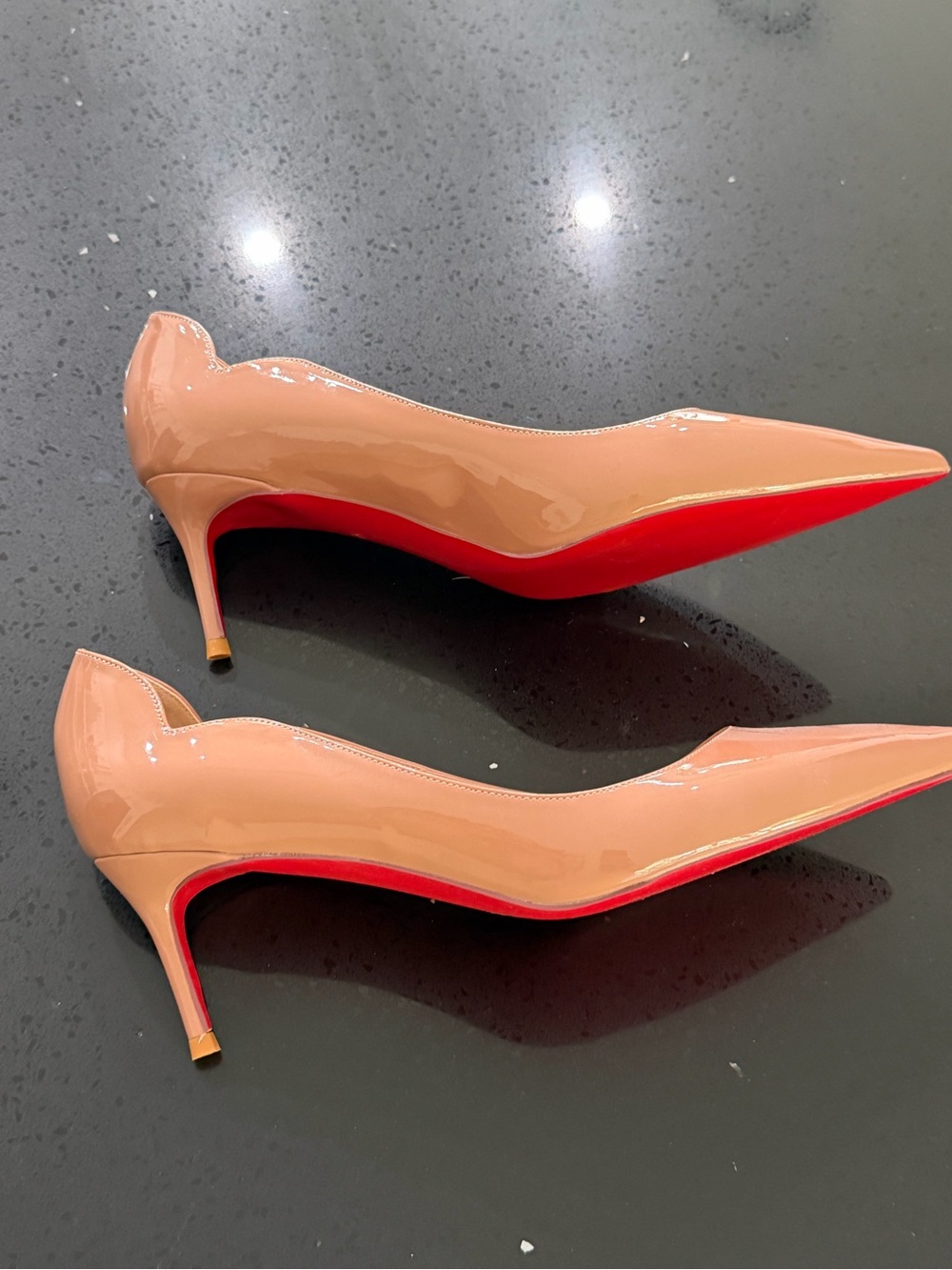 Patent Pointed-Toe Pumps in Nude with Red Sole